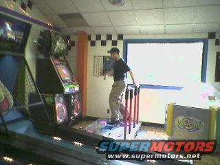 "Dance Dance Revolution", with an older guy gittin' it!