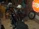 1976 Harley-Davidson Super Glide - A motorcycle sits in a garage filled with various items, including a stop sign and welding equipment.