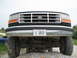 1979 Ford F-150 - Frontal view of a Ford truck, focusing on the grille and suspension system.