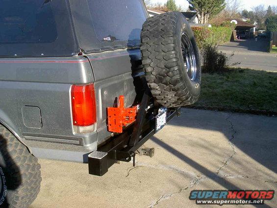 Gray 1987 Ford Bronco rear with custom bumper and spare tire carrier