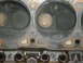 1986 Ford Mustang - Close-up view of engine cylinder heads, showing valves and combustion chambers.