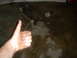 1986 Ford Mustang - Exhaust pipes and a hammer are on the floor, possibly after a repair or before a repair.