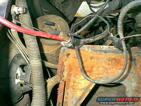 someones-bandaid.jpg We had a couple times the van did not want to start and the charging system seemed low. i found the battery cables needed to be replaced. as i inspected the pos cable i found this mess. it is an old negitive (black) cable connected to a newer pos cable and an aux power take off all connected with a hose clamp. no wonder i saw sparks once in awhile.......they should hang people for this.