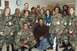 1996 Ford Probe - Denzel Washington poses for a photo with a group of military personnel.