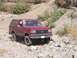 1989 Ford Bronco - This 1989 Ford Bronco tackles a challenging off-road course with its tires gripping the rocks.