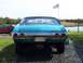 1971 Chevrolet Chevelle - Rear view of a teal 1971 Chevrolet Chevelle parked outdoors with an American flag flying in the background.