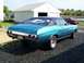 1971 Chevrolet Chevelle - Teal 1971 Chevrolet Chevelle coupe with black vinyl top parked in a driveway, with another car in the background.
