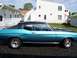 1971 Chevrolet Chevelle - This coupe features a two-tone paint scheme with a black vinyl roof and hood accent.