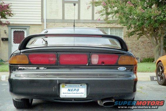 Black 1995 Ford Probe rear view, showing taillights, spoiler, and Virginia license plate