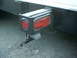 1979 Ford Bronco - Close-up of a trailer's rear lighting system, both circular and oval red lamps.