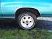 1971 Chevrolet Chevelle - Rear wheel and fender detail of a blue car with aftermarket wheels and BFGoodrich tires.
