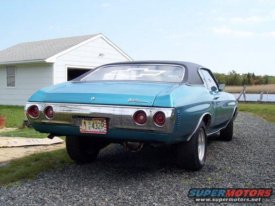 1971 Chevrolet Chevelle rear view, teal paint, black vinyl top, custom plate