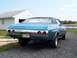 1971 Chevrolet Chevelle - Rear view of a teal 1971 Chevrolet Chevelle with a black vinyl roof and custom license plate.