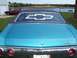 1971 Chevrolet Chevelle - Rear view of a blue 1971 Chevrolet Chevelle with a black roof and a large bowtie decal on the window.