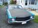 1971 Chevrolet Chevelle - Front view of a blue 1971 Chevrolet Chevelle with a matte black hood.