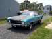 1971 Chevrolet Chevelle - This 1971 Chevrolet Chevelle coupe is seen from a 3/4 front angle on a gravel surface.
