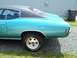 1971 Chevrolet Chevelle - Rear view of a 1971 Chevrolet Chevelle coupe, a teal body and a black vinyl roof.