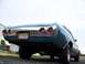 1971 Chevrolet Chevelle - Rear view of a teal 1971 Chevrolet Chevelle, showing its distinctive taillights and chrome bumper.