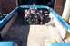 1975 SleekCraft Diplomat - aft to motor and note fuel tanks on either sidein gunnels