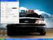 1999 Ford Crown Victoria - This is a police car, likely a Ford Crown Victoria, with its emergency lights illuminated.