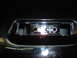 1978 Ford Mustang II - Close-up view of a chrome bumper section, showing two circular holes and rectangular cutouts.