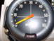 1978 Ford Mustang II - The tachometer shows RPMs and includes a HI BEAM indicator light, typical of older vehicle interiors.