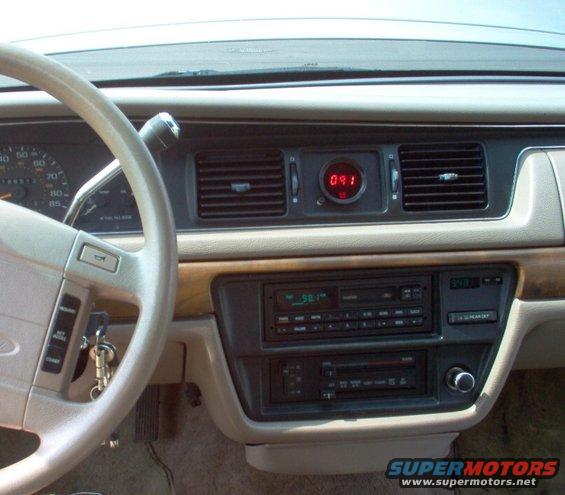 tachfinished.jpg I probably could have done a little better, but I don't like the look of the display.  I've pulled it out, and it's for sale now.

UPDATE: After 4 years, the tach driver crapped out & killed the engine by shorting the CPS, so I ripped its wires loose, but it's still tucked under the cruise servo (abandoned in-place).