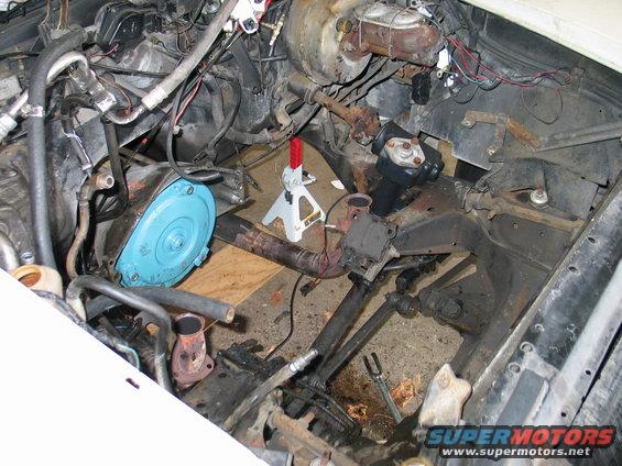 1981 Chevrolet Corvette engine bay, white exterior, showing transmission and engine components