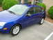 2005 Ford Focus - This blue 2005 Ford Focus hatchback is shown from a 3q front angle.