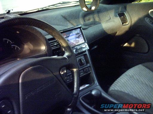 pict00031.jpg notice the GT on the airbag, custom short throw shifter, and of course the eclipse screen!!