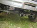 1979 Ford Bronco - Undercarriage view of a 1979 Ford Bronco, showing the rear axle and differential.