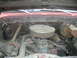 1979 Ford Bronco - The engine bay of a 1979 Ford Bronco, showing the V8 engine, air cleaner, and brake booster.