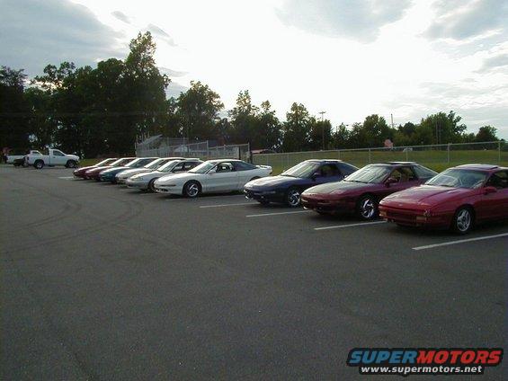 Line of 1994 Ford Probes parked side-by-side