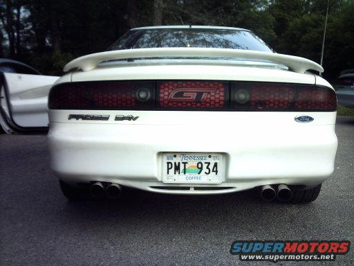 White 1995 Ford Probe GT rear view with dual exhaust and Tennessee license plate PMT 934