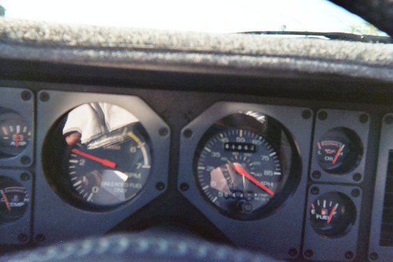 1985 Ford Mustang dashboard with tachometer and speedometer