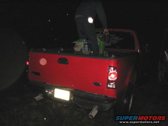 steve-bike.jpg steve goin through the trails in the bed of the truck