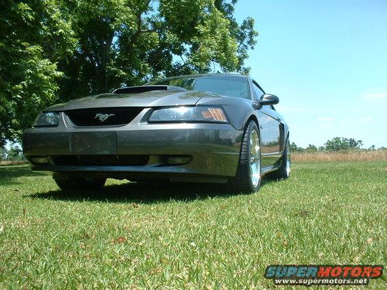 Gray 2003 Ford Mustang front 3/4 view with hood scoop