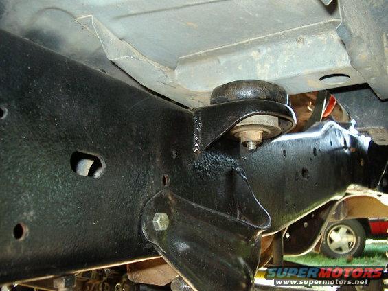 Frame and suspension mount with another vehicle in background