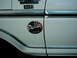 1978 Ford Bronco - A white 1978 Ford Bronco XLT is shown from the side, a decorative sticker.