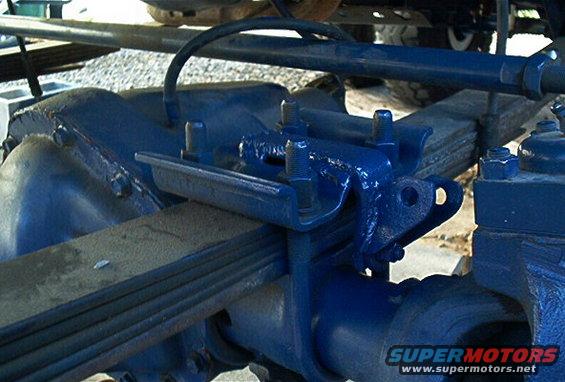 im001050.jpg Here's what I came up with for lower shock mounts.  This problem has plagued me for months and this is my solution.  I used 3/8s angle iron and the stock shock mounts from the old TTB.  I then  cut the mounts for clearance, drilled the angle iron so I could move the mount untill I got it lined up.  Once it lined up with the upper mounts I welded the whole assy.