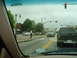 1981 Ford Bronco - A silver SUV is seen at a street intersection on an overcast day.