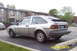 1983 Volkswagen Scirocco - Rear view of a silver 1983 Volkswagen Scirocco, parked in a lot with apartment buildings in the background.