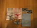 2002 Ford Taurus - Various decals for the Taurus Car Club of America are laid out on a wooden surface.