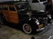 1978 Ford Bronco - This black woody wagon features distinctive wood paneling and a vintage California license plate.