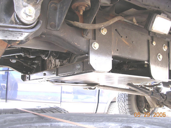 belly1.jpg mounts are on the side to prevent rock damage.  This shows where the break is, the other side is pieces of the break that i torched out and welded on.