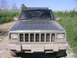 2000 Jeep Cherokee - This Jeep Cherokee is covered in mud after an off-road excursion.