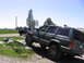 2000 Jeep Cherokee - Two SUVs are seen off-roading on a sunny day with a clear blue sky.