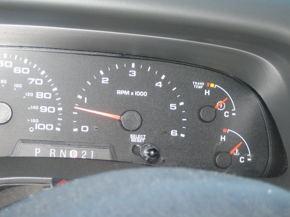 The newer ford f-350's come with a factory Trans temp gauge!