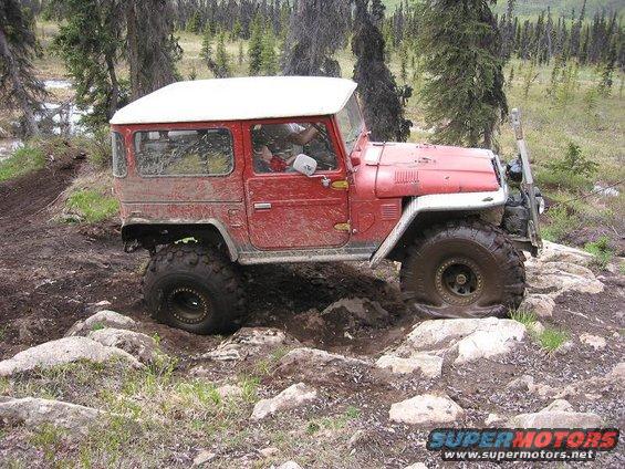 img_2477.jpg Gabe's turn. He walks right over it with his 42's at 3.5 PSI. Check out that tire flex!