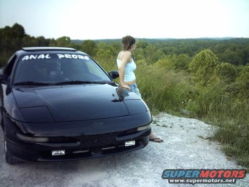 Black 1995 Ford Probe with "ANAL PROBE" windshield banner